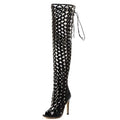 Black studded lace up heel sandal boots featuring over-the-knee design with mesh and studded accents