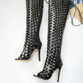 Black studded lace over-the-knee heel sandal boots with glossy finish and intricate rhinestone lattice design