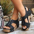 Black studded leather zipper wedges sandals with silver studs cork soles and lightweight height increasing design