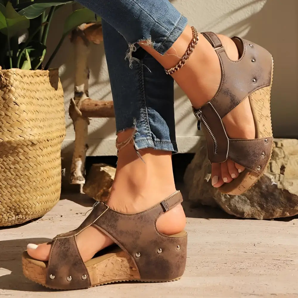Brown distressed leather zipper wedges sandals with cork soles silver studs and lightweight height increasing design