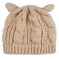 Beige knitted cat ear beanie with cable knit pattern and soft rounded ear-like protrusions in cozy style