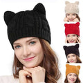 Black textured cute knitted cat ear beanie with a textured cable knit pattern in black yarn