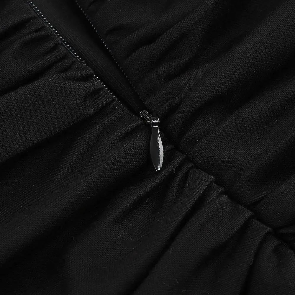 Black v-neck backless long sleeves skirt waist gown showing black ruched fabric with sleek metallic zipper pull