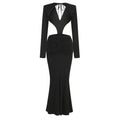 Black v-neck backless long sleeves skirt waist gown with ruched waist and back tie detail viewed from the back