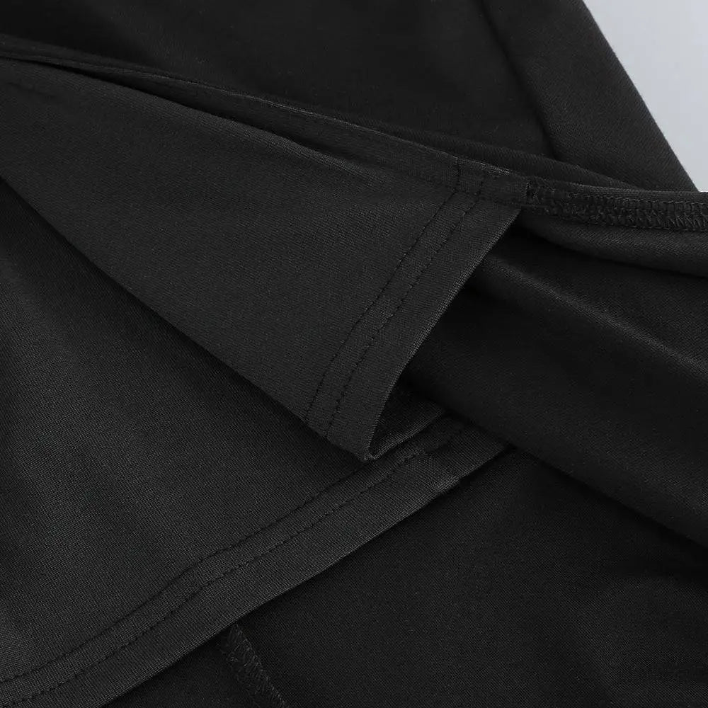 Black v-neck backless long sleeves skirt waist gown with neatly stitched seams in black cotton fabric