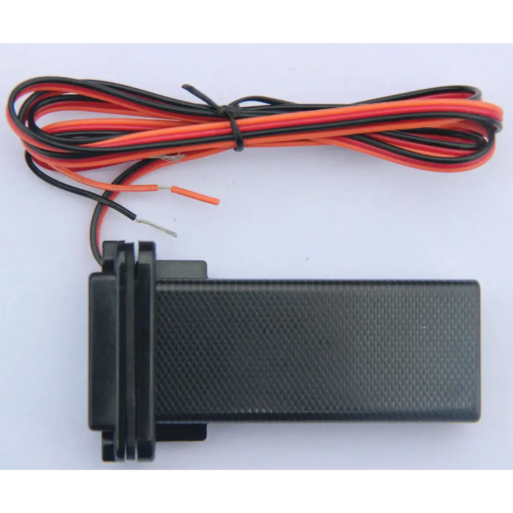 Black vehicle tracking gps locator with textured surface and red black wires for vehicle tracking applications