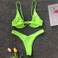 Bright neon green two-piece bikini set with thin straps and metallic clasp in black velvet summer swimwear bikini style