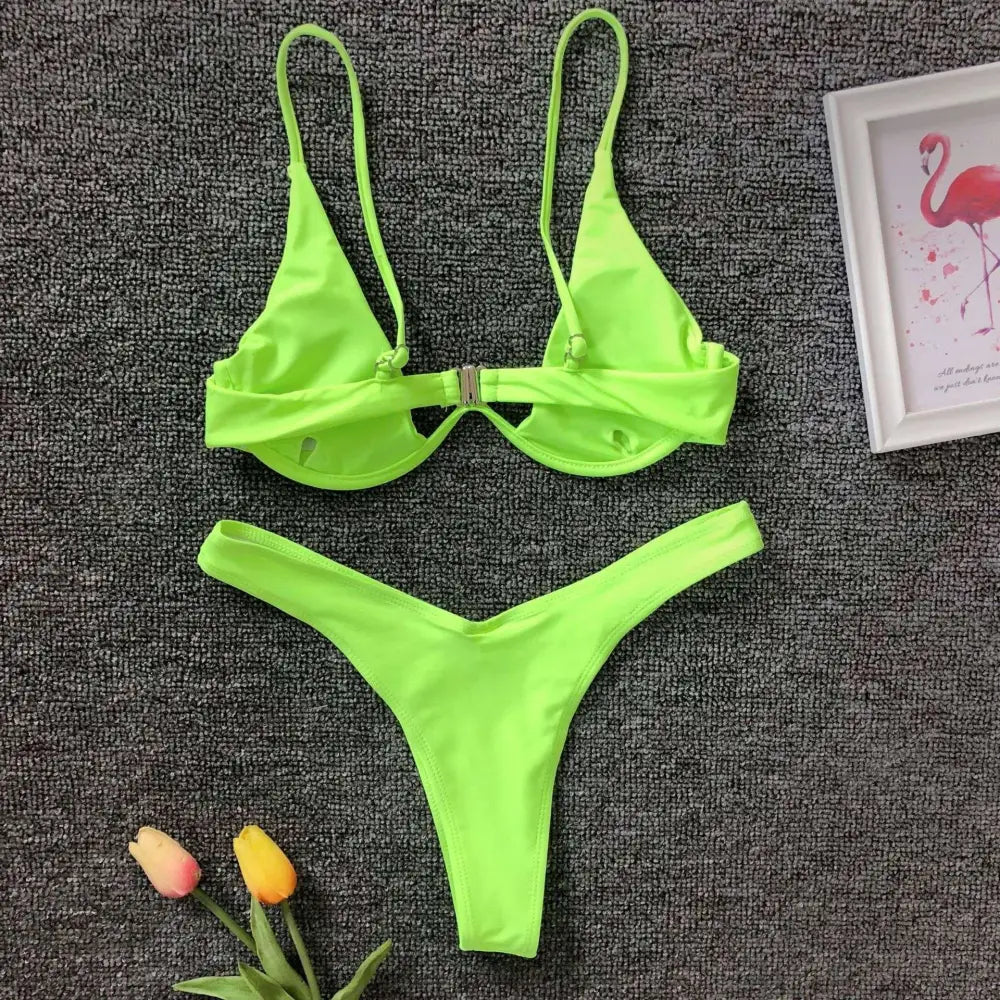 Bright neon green two-piece bikini set with thin straps and metallic clasp in black velvet summer swimwear bikini style