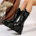 Black versatile casual leather platform boots with patent finish, silver buckles, lace-up design, and chunky soles