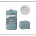 Light blue oxford cloth portable women makeup bag with mesh compartments and hanging hook for black wall mounted use