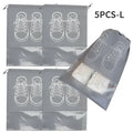 Black wall mounted portable women makeup bag with gray translucent shoe storage bags featuring white sneaker outlines