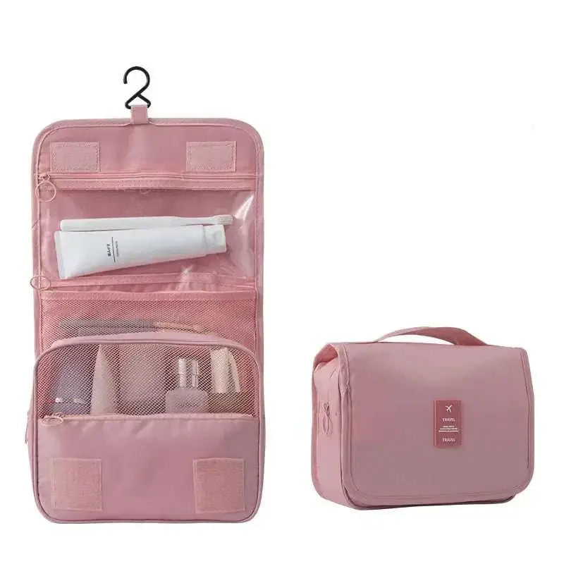 Pink travel toiletry organizer with mesh compartments and hanging hook for black wall mounted portable women makeup bag