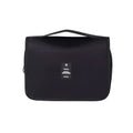 Black wall mounted portable women makeup bag with minimalist black toiletry design and travel label with airplane icon