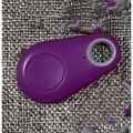 Purple silicone black water drop anti lost object finder bluetooth tracker with circular cutout and smooth rounded edges