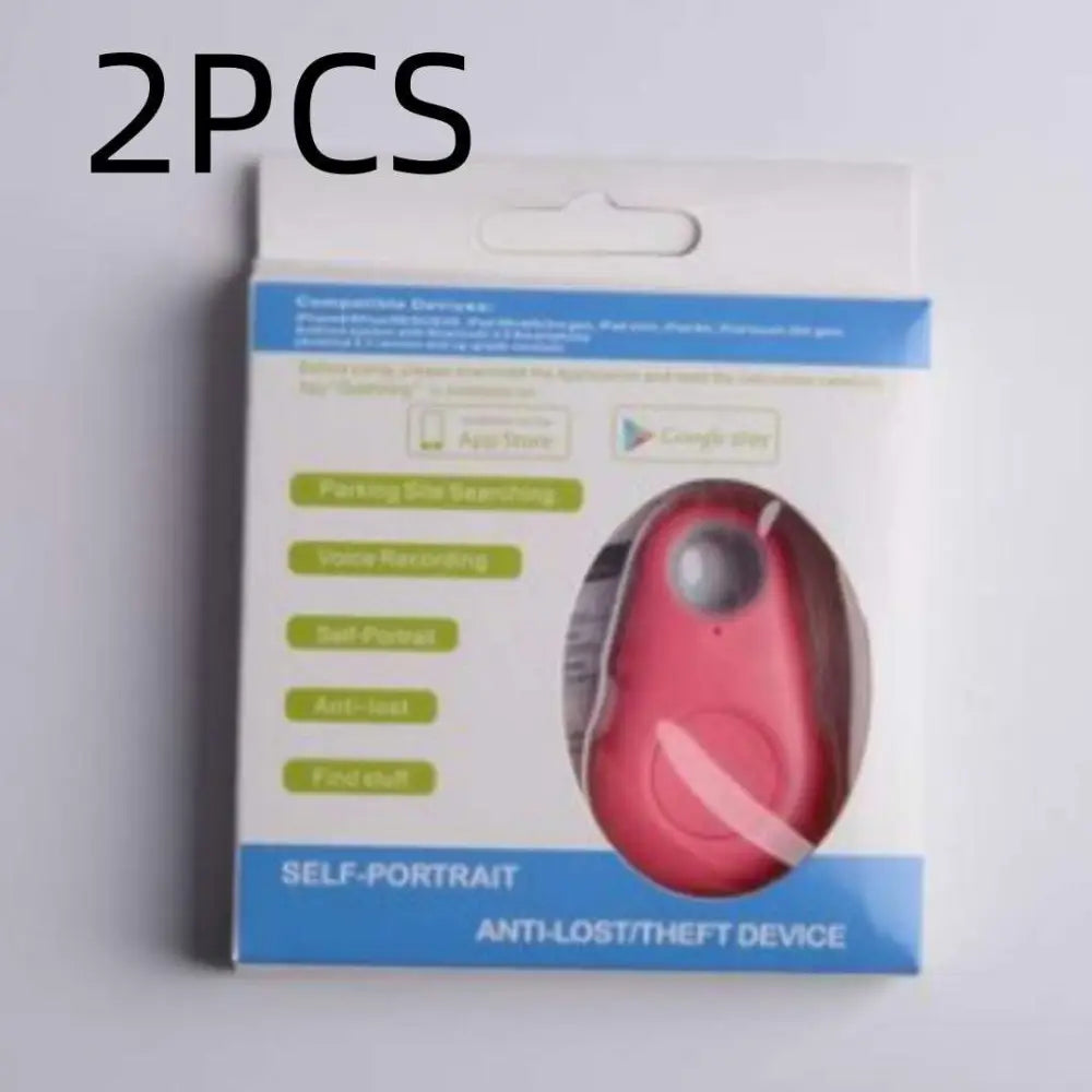 Black water drop anti lost object finder in pink oval shape with white strap and silver button for lost object finder use