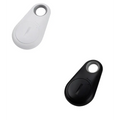 Black and white bluetooth lost object finder with sleek oval design and circular button for anti lost object use