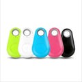 A sleek lime green black water drop bluetooth tracker designed as an anti lost object finder for easy tracking