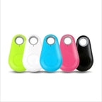 A sleek lime green black water drop bluetooth tracker designed as an anti lost object finder for easy tracking