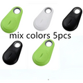 Set of five sleek oval-shaped black water drop anti lost object finder bluetooth trackers in green white and black colors
