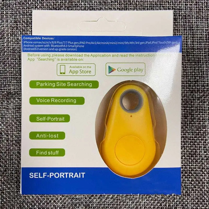 Yellow self-portrait bluetooth tracker with circular button and gray ring for black water drop anti lost object finder