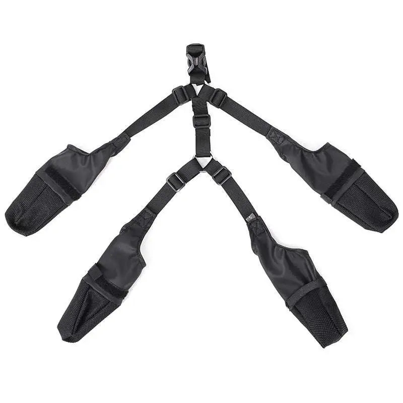 Black tactical-style dog harness with four adjustable straps and mesh-lined pockets paired with waterproof adjustable dog shoes for hot pavements