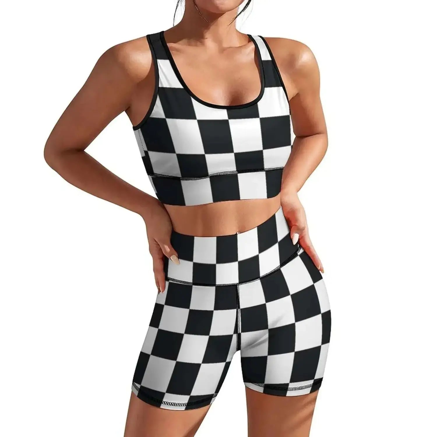 black and white checkered athletic two-piece set featuring a sports bra with black trim and high waist shorts designed as fitness attire to boost your performance