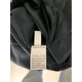 Black polyester garment care label with white text and symbols for winter sexy backless sequined mermaid gown