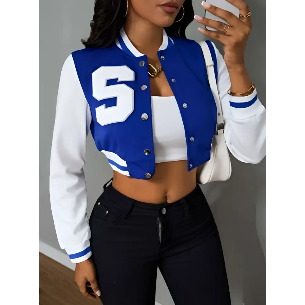 Blue and white ladies printed baseball jacket featuring a large s and classic varsity style front design