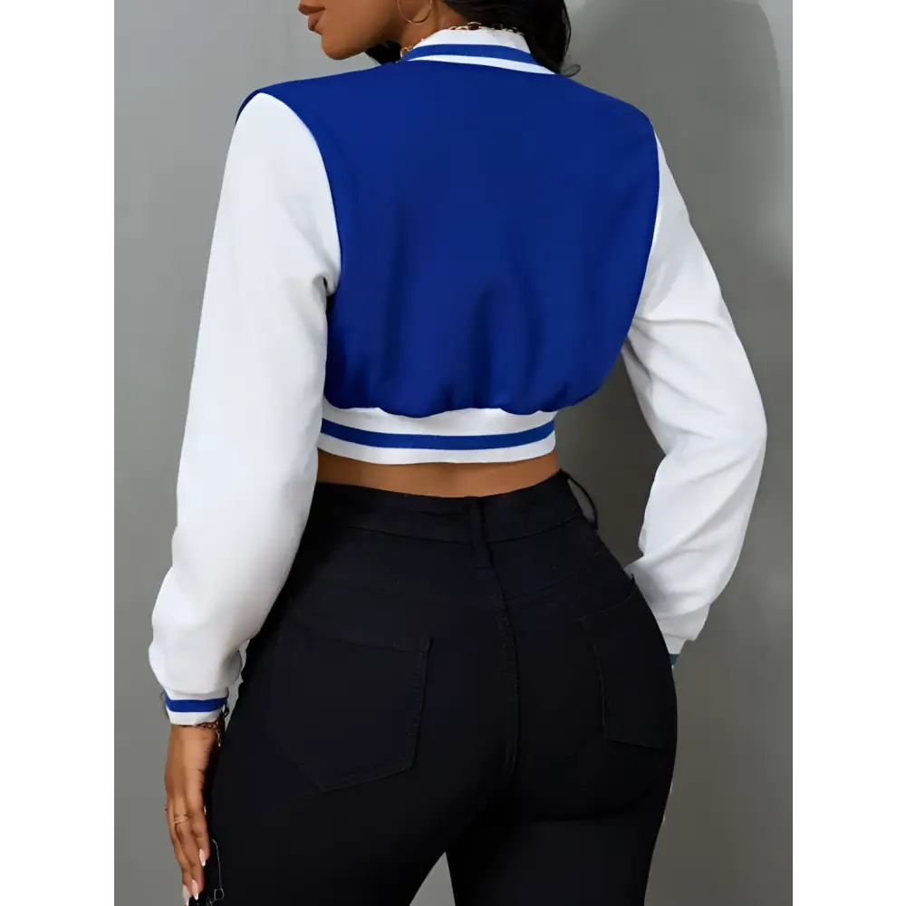 Blue and white ladies printed baseball jacket with large s on chest button closures and ribbed cuffs