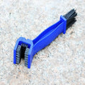 Blue plastic bicycle cleaning tool with large black bristle brush for effective bicycle maintenance
