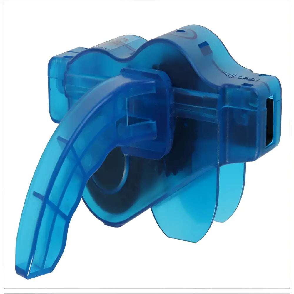 Blue plastic bicycle cleaning tool with large bristle and curved handle featuring integrated chain cleaning mechanism