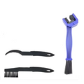 Blue plastic bicycle cleaning tool with large bristle and curved end for removing dirt from bike chains