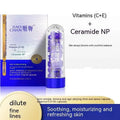 A transparent cylindrical bottle with blue base and cap containing purple jiao chan chicken leg anti aging essence capsules