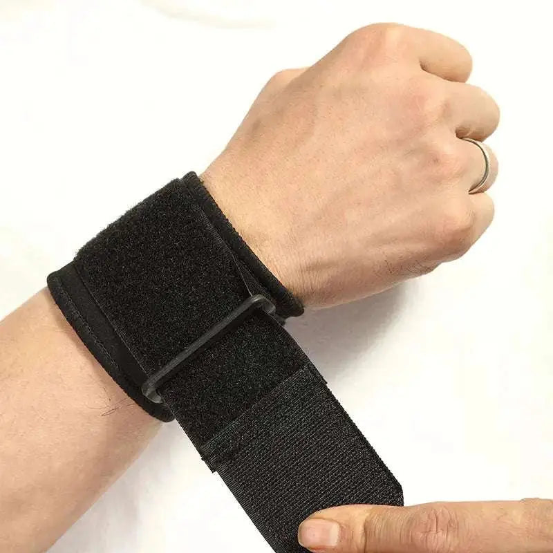 Black velcro wrist support brace worn on hand with blue breathable wrist strap for comfort and stability