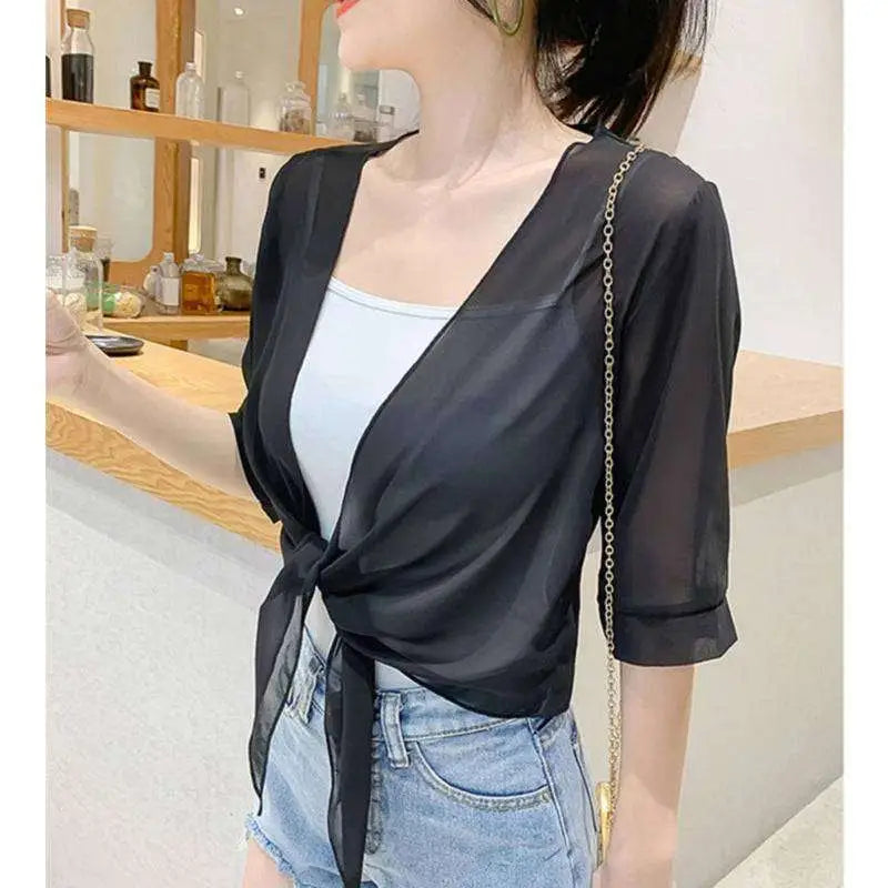Black sheer chiffon wrap top with three-quarter sleeves and tied front knot for elegant chiffon short shawl style
