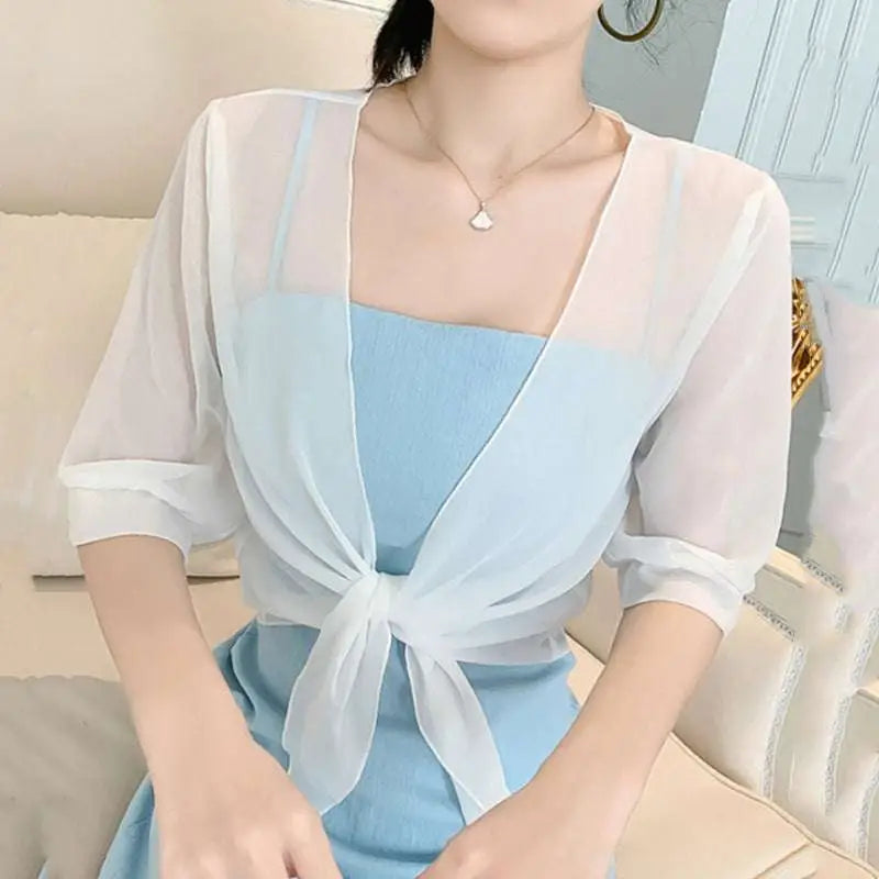 Light blue chiffon short shawl with three-quarter sleeves and tied front knot perfect for summer wear