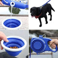 Blue collapsible pet water bottle with white rim and integrated retractable dog leash and pet rope for convenience