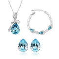 A silver-toned creative alloy necklace with a pear-shaped blue crystal pendant and clear crystal accents