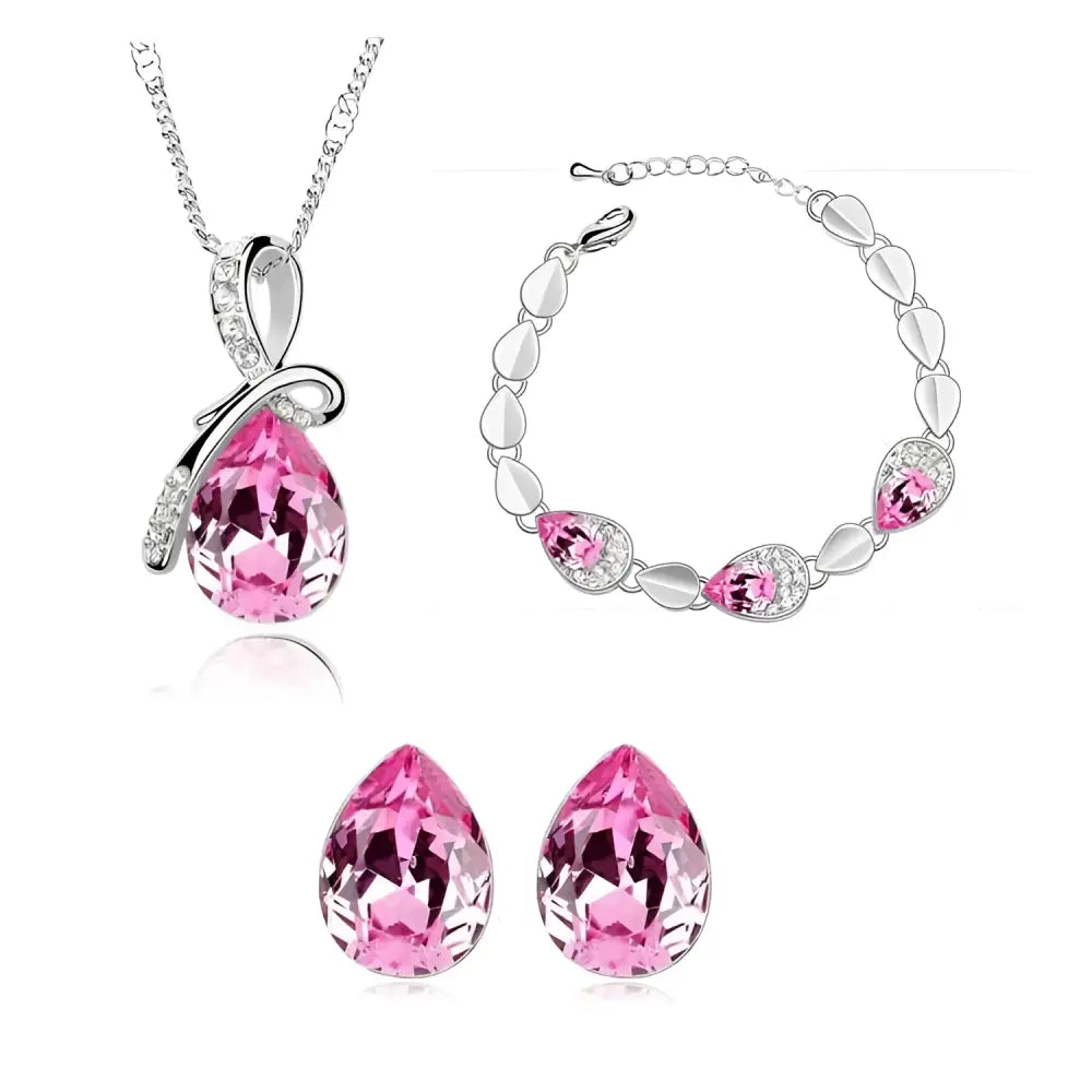 Pink teardrop crystal pendant necklace with silver-toned creative alloy chain and diamond accents from blue crystal alloy set