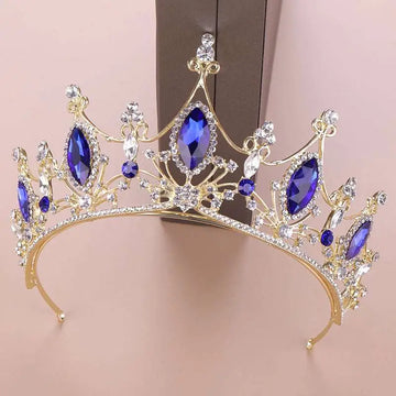 Golden headband adorned with blue crystal crown bride featuring deep blue and clear crystal embellishments