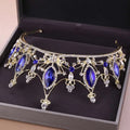 A gold-toned crystal crown bride blue crystal crown golden headband adorned with deep blue and clear crystals