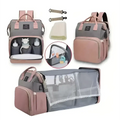 A stylish blue denim large capacity mommy bag in gray and rose gold with multiple compartments and pink fabric straps