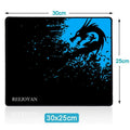 Black and blue dragon-themed gaming mousepad with sleek modern design featuring blue dragon for luxury women’s fashion use