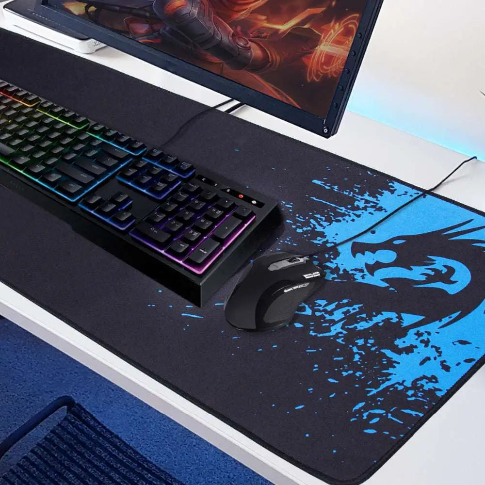 Black gaming mousepad featuring a bold blue dragon graphic with splatter design for luxury women’s fashion and black rakoon