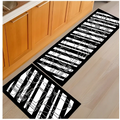 Black and white striped kitchen mat with utensil illustrations from blue fish machine washable door mats collection