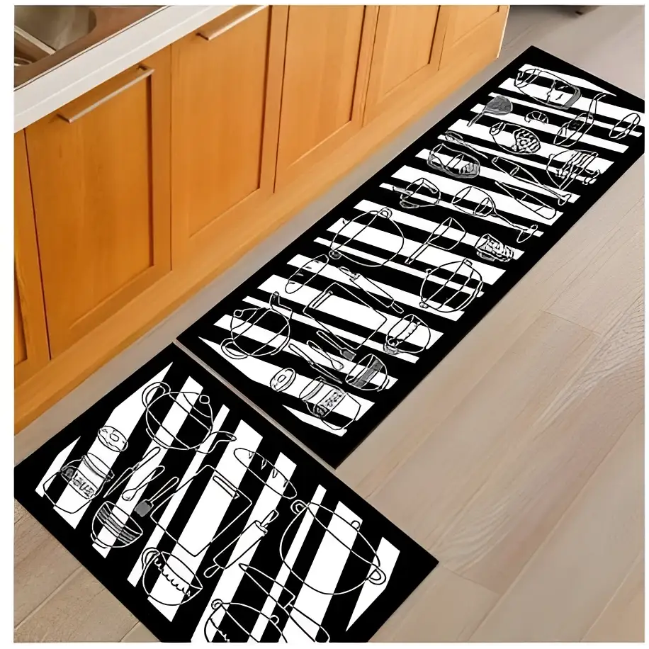 Black and white striped kitchen mat with utensil illustrations from blue fish machine washable door mats collection