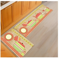Two beige rectangular kitchen mats with colorful teapot and plate illustrations from blue fish machine washable door mats