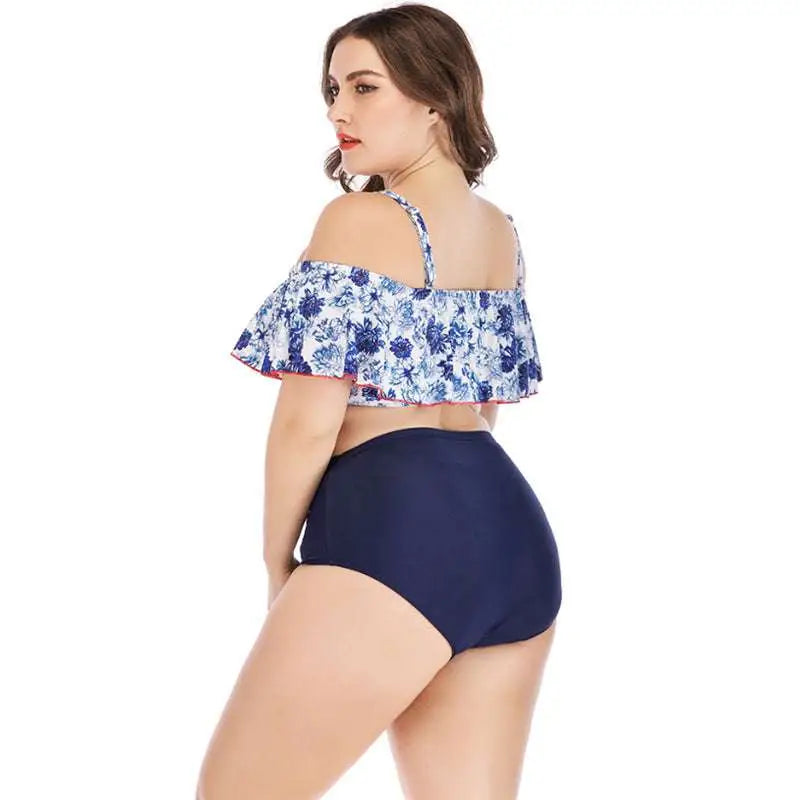 Blue floral printed plus size swimsuit featuring white floral off the shoulder top with ruffled hem and navy swim bottoms