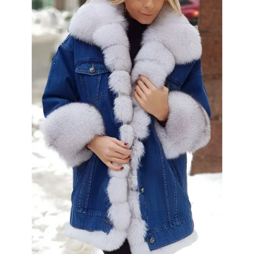 Blue denim long sleeve coat with fur trim on the collar cuffs and front placket in light gray fur trim denim