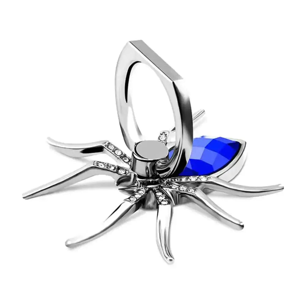 Silver spider phone ring with vibrant blue faceted gem and rhinestones along its legs for elegant grip and style